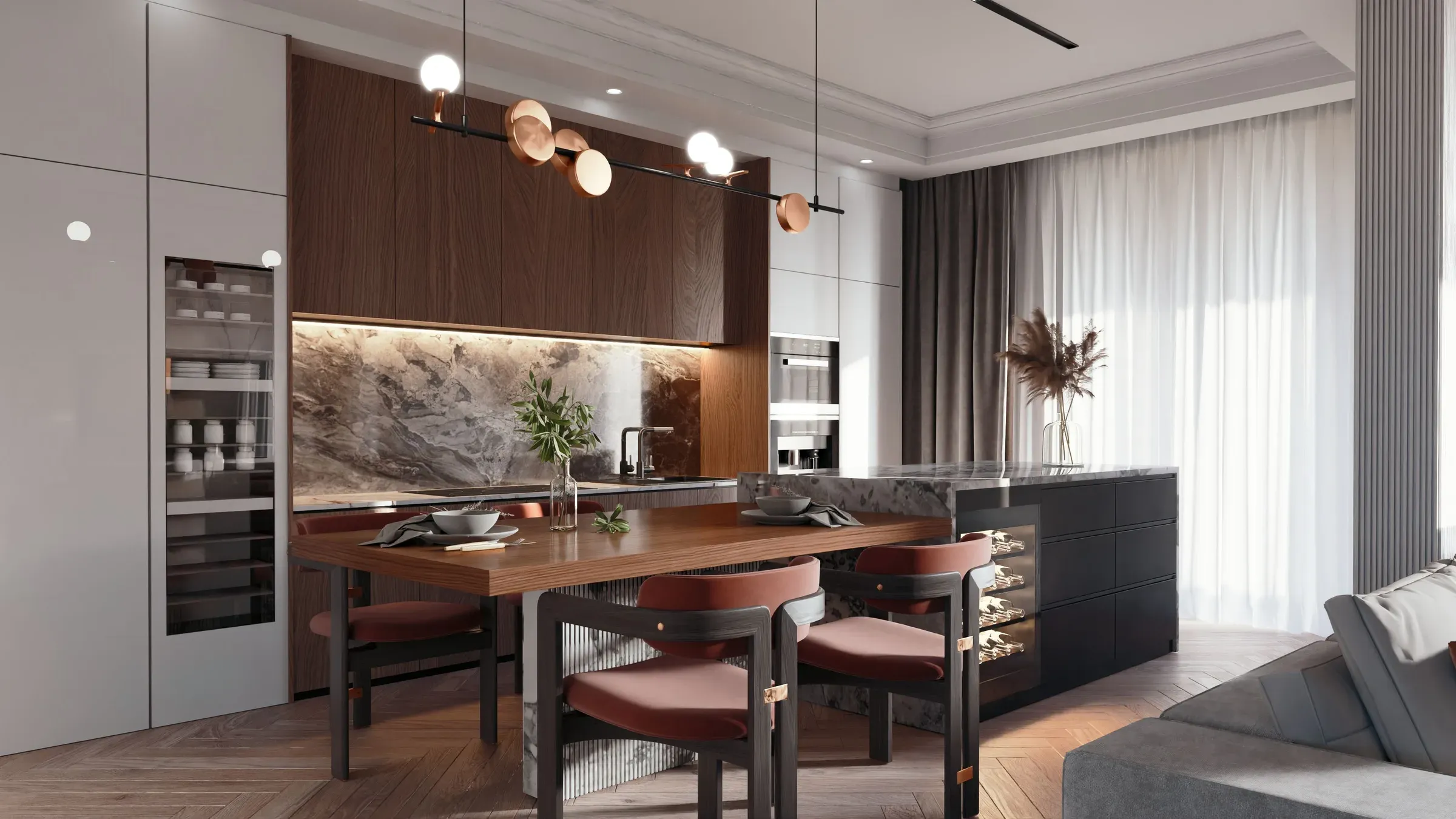Open walnut kitchen with a marble backsplash, island and a wooden dining table with terracotta chairs