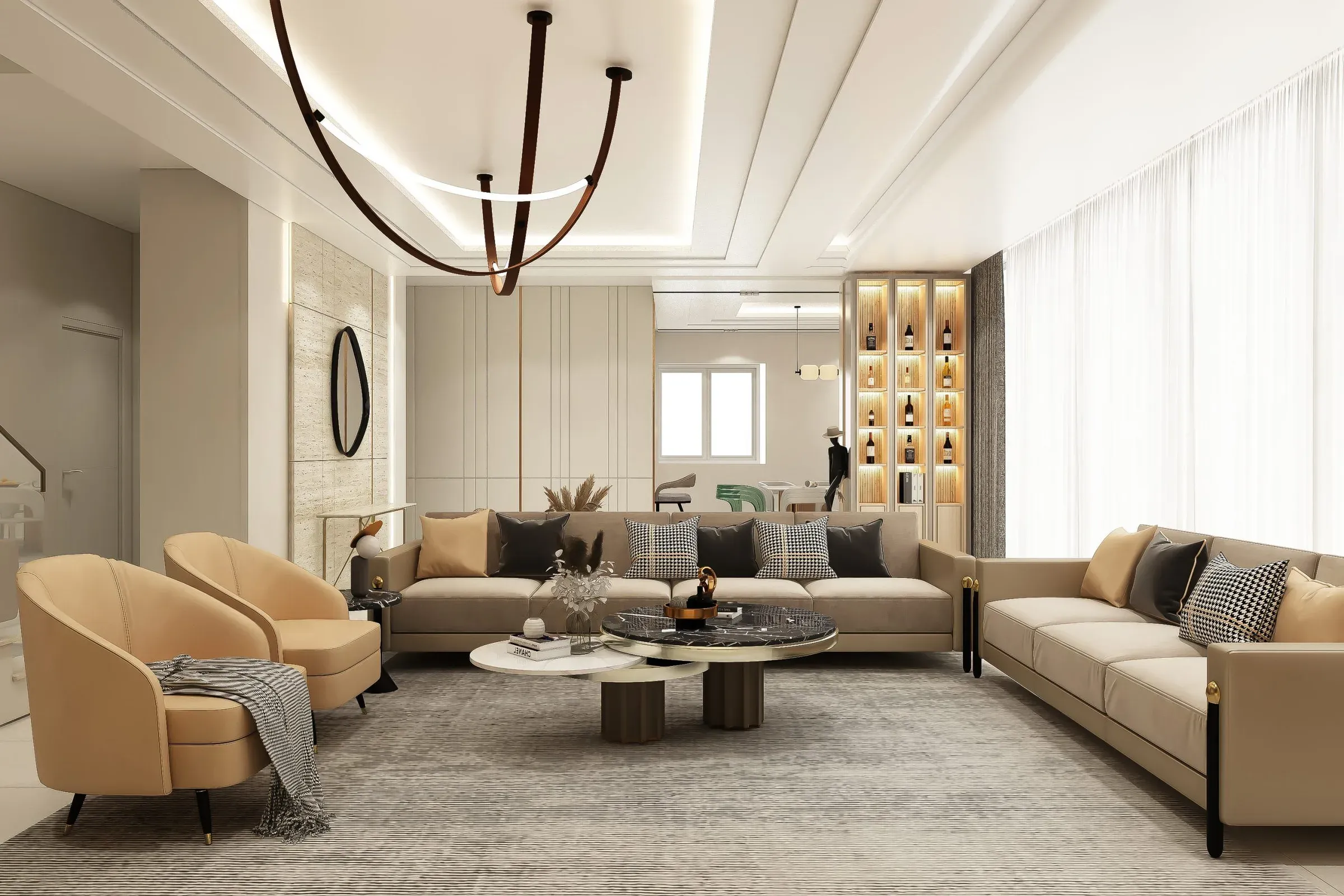 Modern living room with beige sofas, two curved armchairs, round coffee tables and a lit display niche
