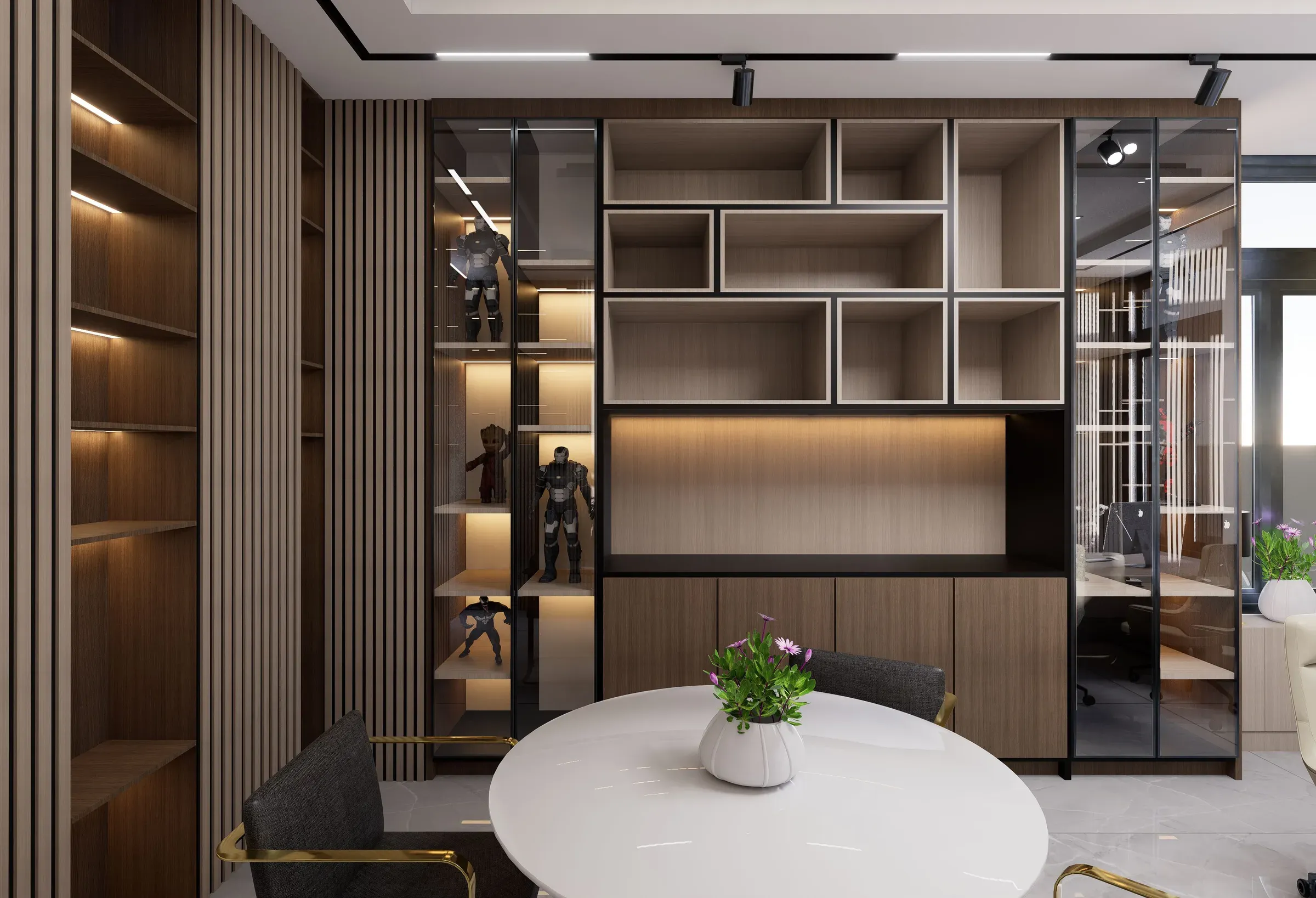 Study corner with a full-wall wooden bookshelf, glass display cabinets, lit shelves and a round white table