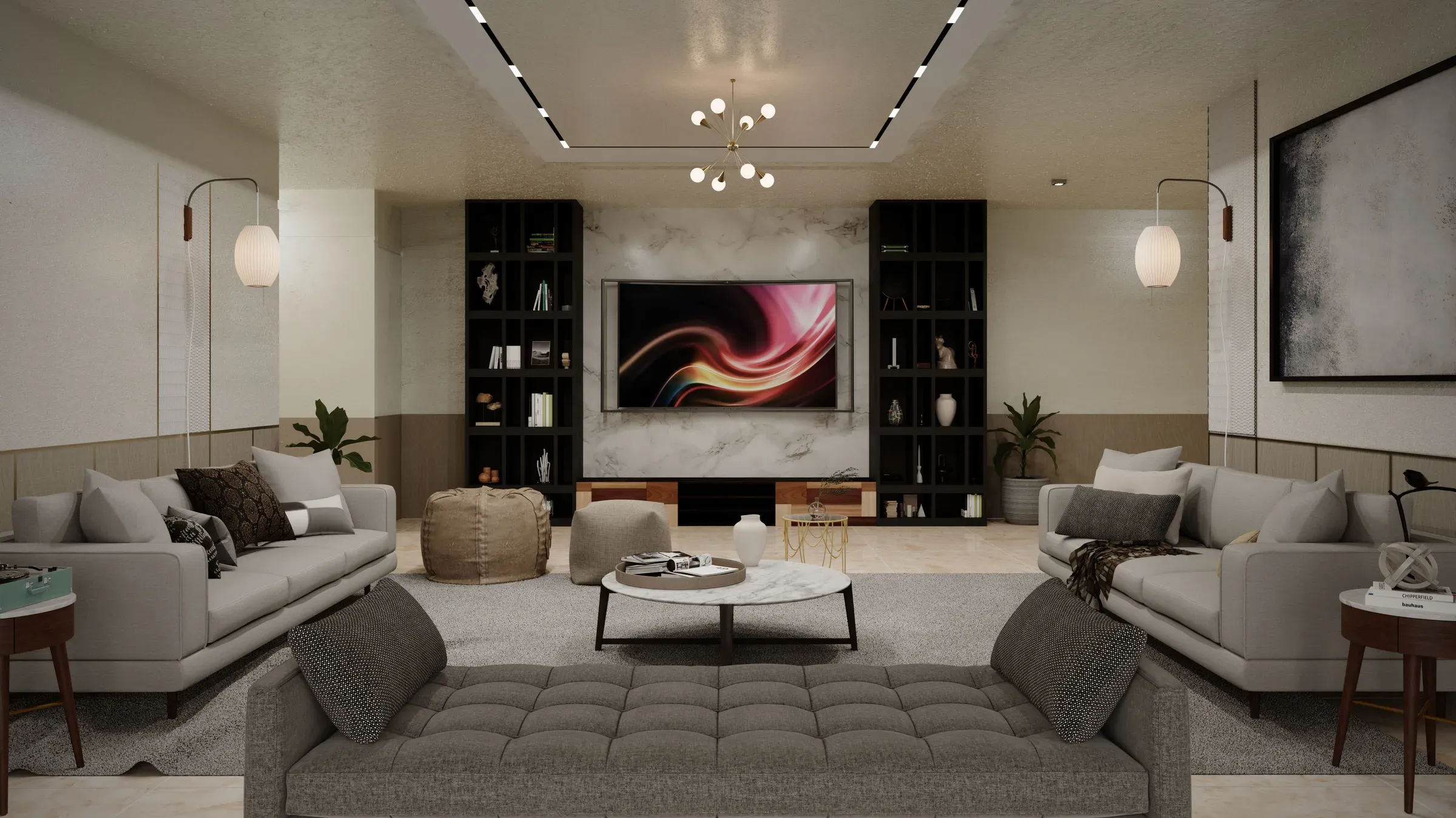 Media room with a TV on a marble wall between black bookcases, grey sofas and track lighting